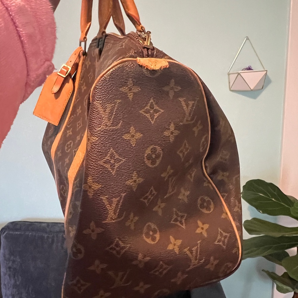 Louis Vuitton Duffle - Picture 5 of 12
